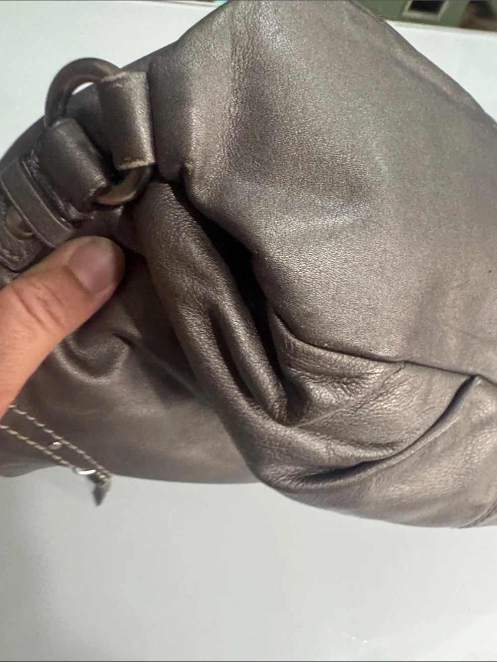 Coach Y2K Madison hobo bag featuring metallic pewter leather and silver studded